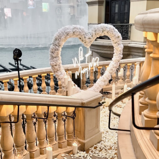 Romantic 'Will You Marry Me' Proposal with a White Rose Heart-Shaped Arch
