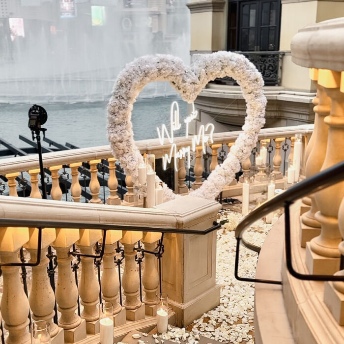 Romantic 'Will You Marry Me' Proposal with a White Rose Heart-Shaped Arch