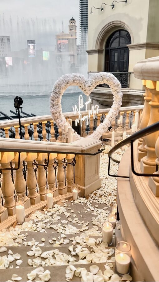 Romantic 'Will You Marry Me' Proposal with a White Rose Heart-Shaped Arch