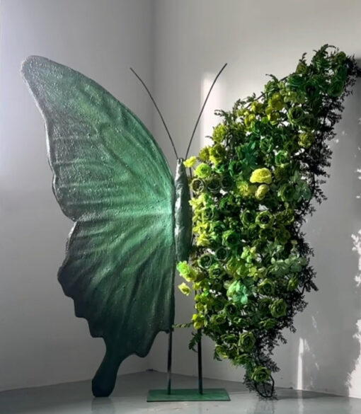 Serene Teal Butterfly Backdrop with Lush Green Roses for Luxury Event Decor
