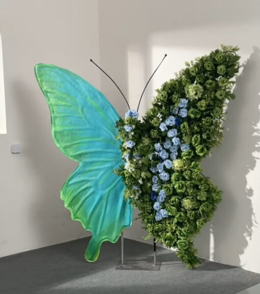 Serene Teal Butterfly Backdrop with Lush Green Roses for Luxury Event Decor