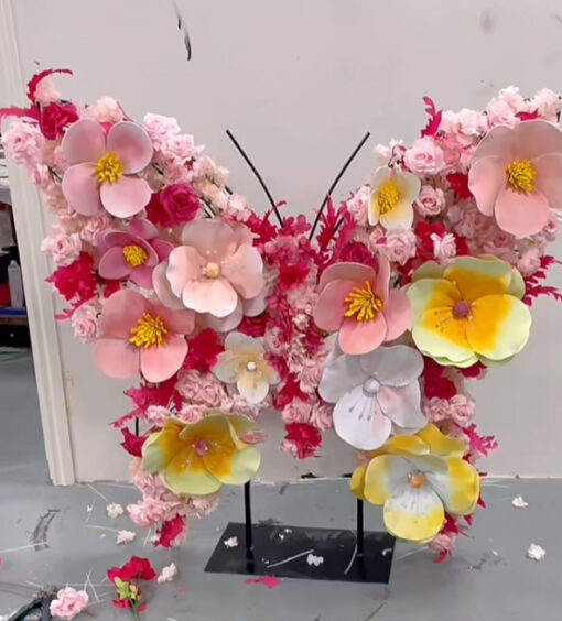 Soft Pastel Butterfly Backdrop with Vibrant Yellow Accents for Dreamy Spring Celebrations
