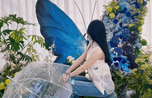 Sophisticated Butterfly Backdrop with Cool Tones and Blue Roses for Photo Booths