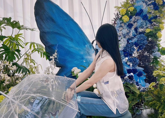 Sophisticated Butterfly Backdrop with Cool Tones and Blue Roses for Photo Booths