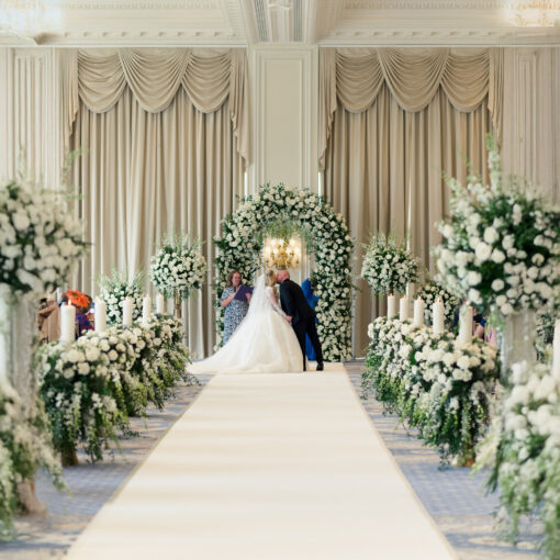 Sophisticated Luxury Wedding Decor: Greenery Arch with White Roses for a Perfect Wedding