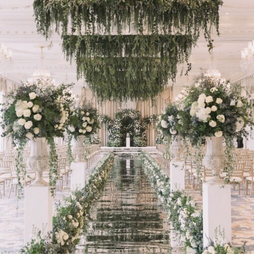 Sophisticated Luxury Wedding Decor: Greenery Arch with White Roses for a Perfect Wedding
