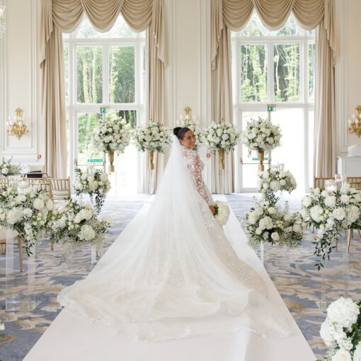 Sophisticated Luxury Wedding Decor: Greenery Arch with White Roses for a Perfect Wedding