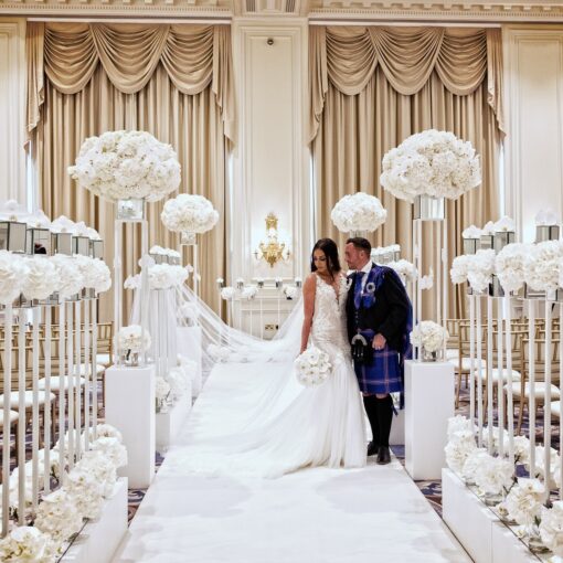 Sophisticated Luxury Wedding Decor: Greenery Arch with White Roses for a Perfect Wedding