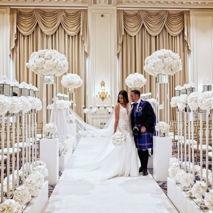 Sophisticated Luxury Wedding Decor: Greenery Arch with White Roses for a Perfect Wedding
