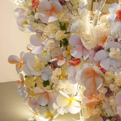 Sophisticated Warm Tone Butterfly Backdrop with Artificial Flowers and LED Elements