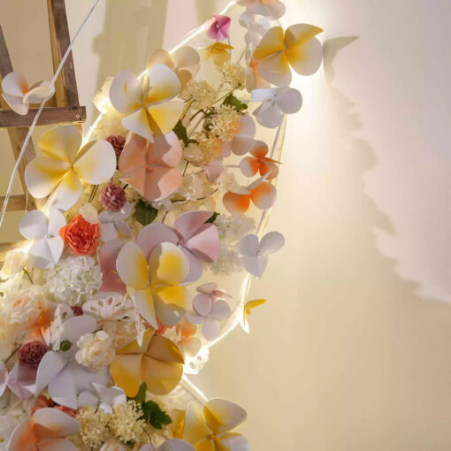 Sophisticated Warm Tone Butterfly Backdrop with Artificial Flowers and LED Elements