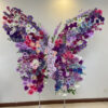 Spring-Inspired Butterfly Backdrop with Elegant Purple and Pink Floral Details