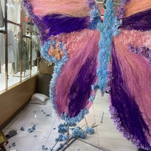 Spring-Themed Gradient Pink and Purple Butterfly Backdrop with Artistic Floral Details