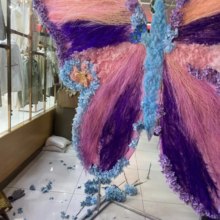 Spring-Themed Gradient Pink and Purple Butterfly Backdrop with Artistic Floral Details
