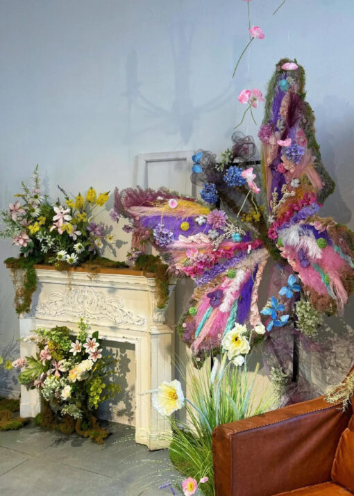 Spring-Themed Gradient Pink and Purple Butterfly Backdrop with Artistic Floral Details