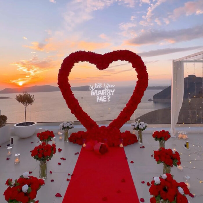 Stunning Heart Shaped Flower Arch with Red Roses for a Perfect Proposal
