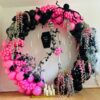 Stylish Pink and Black Halloween Backdrop for a Creepy and Fun Party