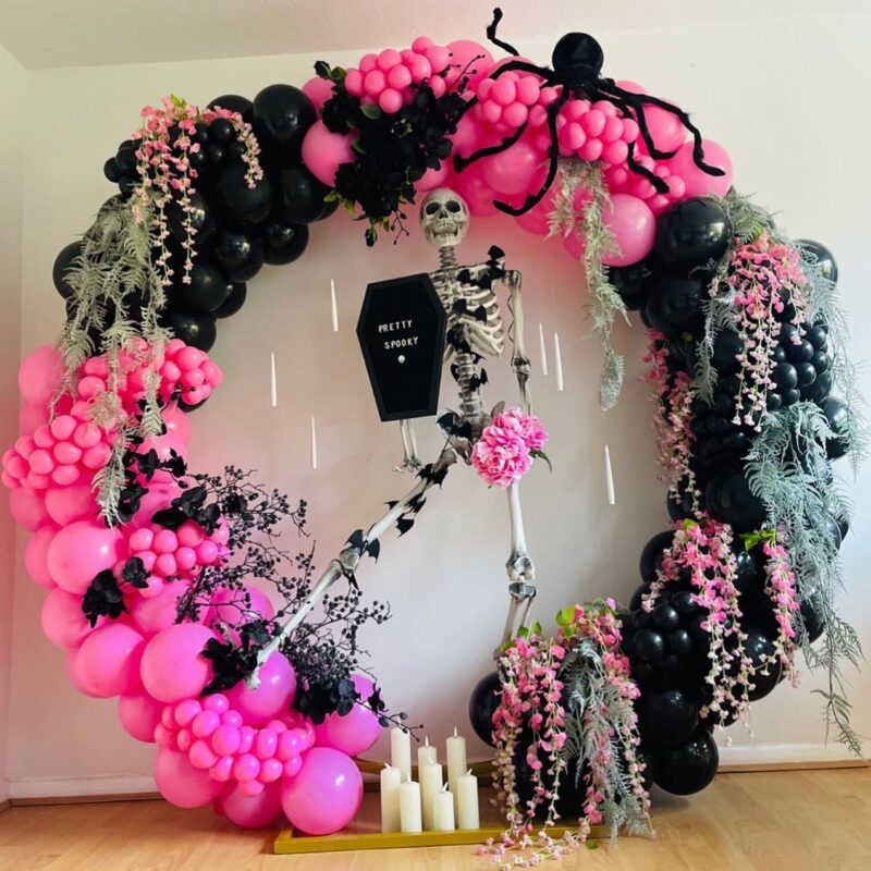 Stylish Pink and Black Halloween Backdrop for a Creepy and Fun Party