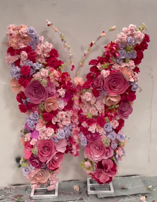 Timeless Butterfly Backdrop with Pastel Roses for Elegant Wedding Decorations