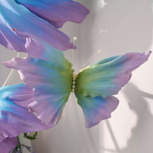Whimsical Gradient Blue and Purple Butterfly Backdrop for Enchanting Events